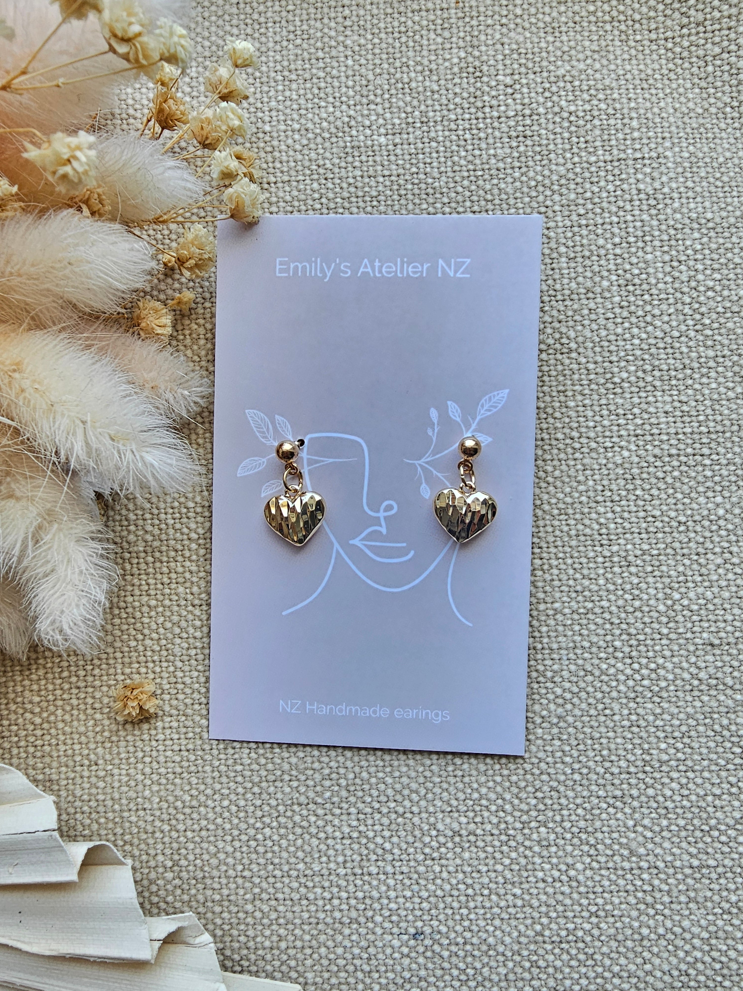 Heart rock gold studs