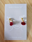 Red bow gold studs