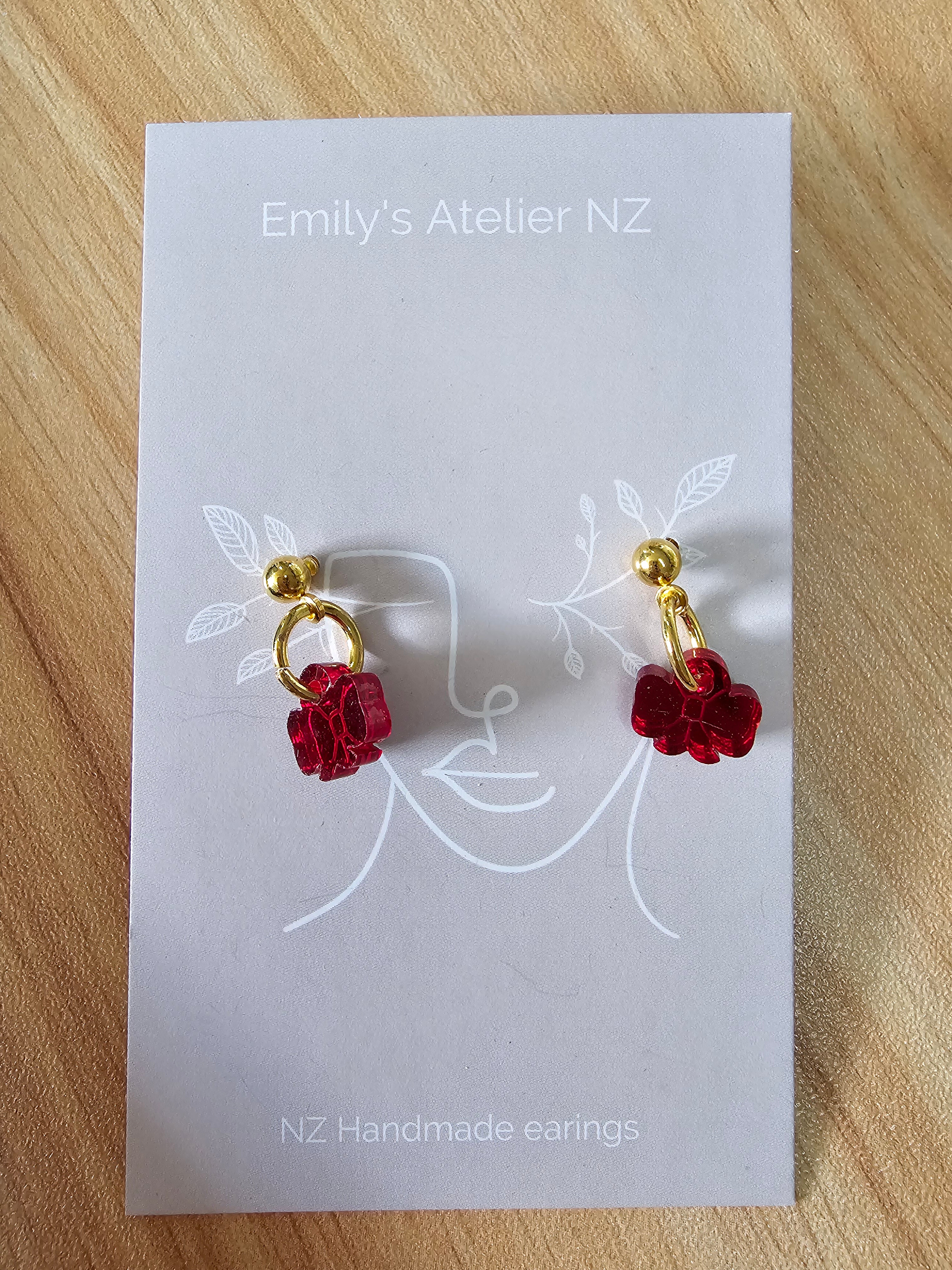 Red bow gold studs