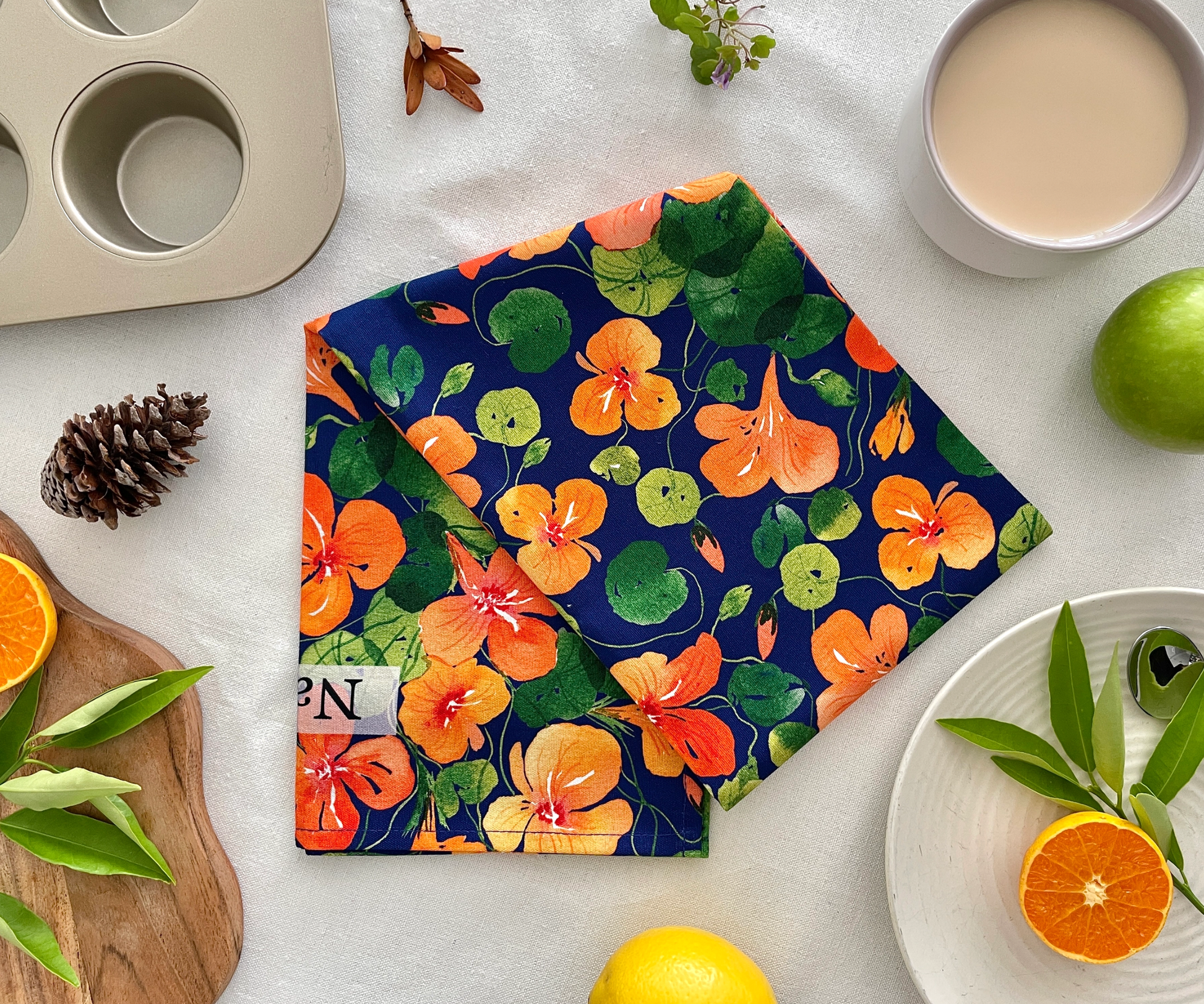 Nasturtium Dreams Tea Towel on the Table