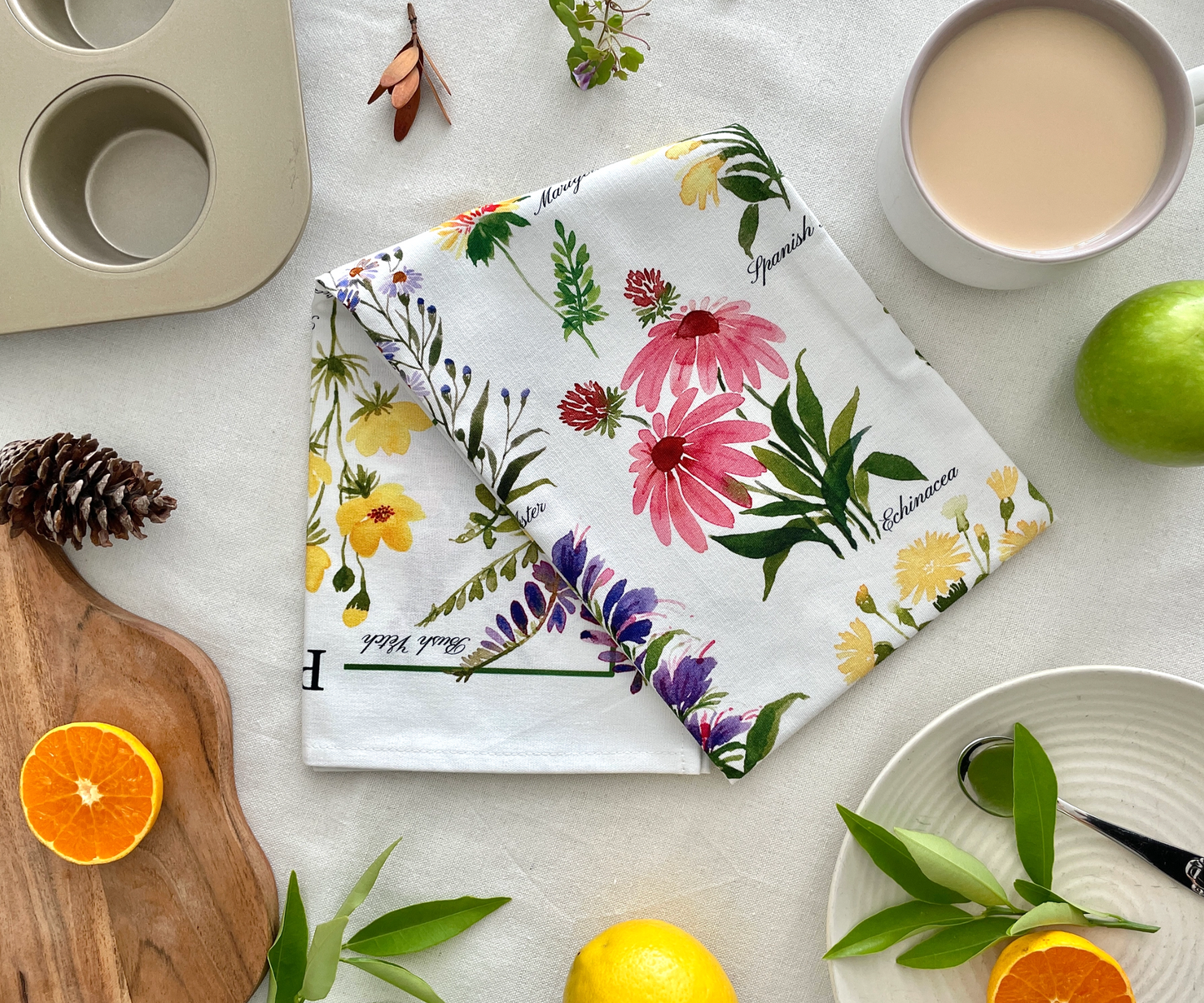 Petals of the Wild Tea Towel on the Table